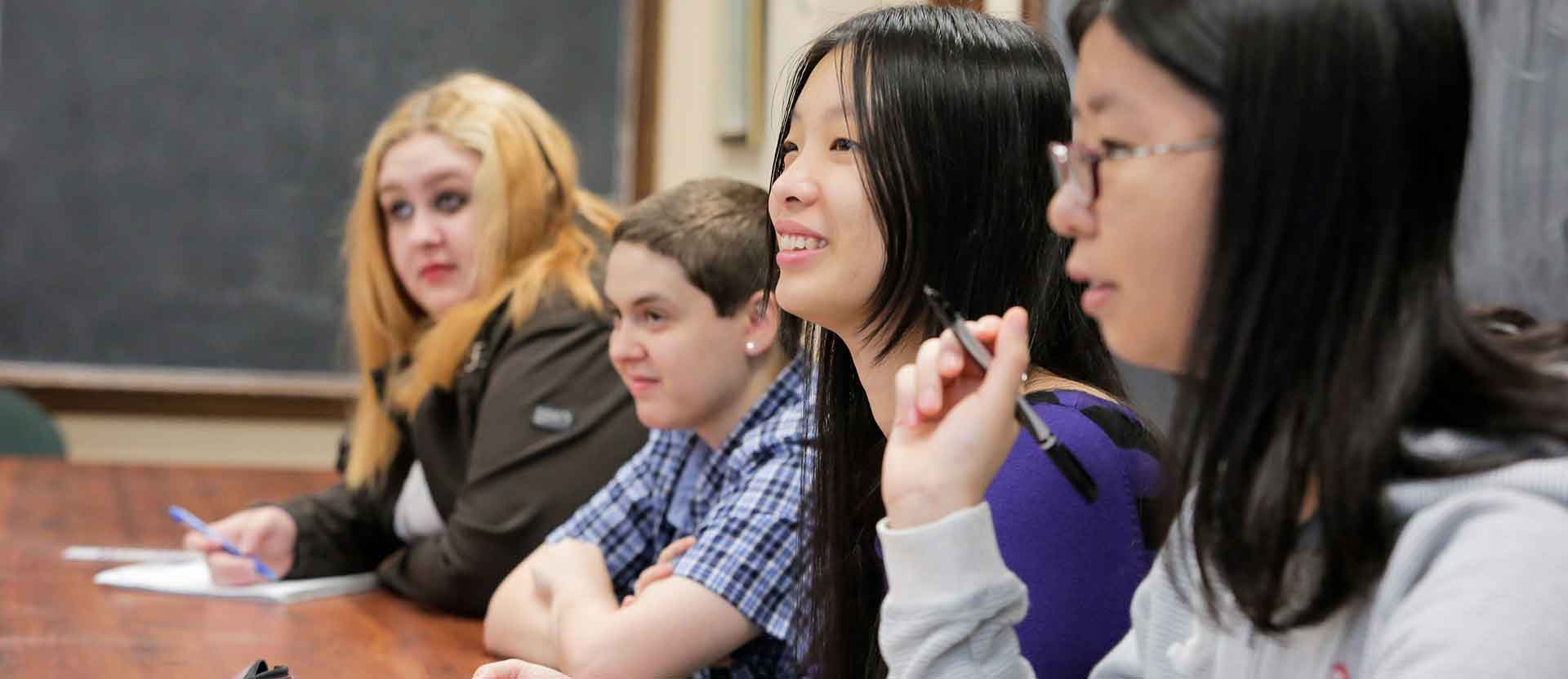 English students listen intently during class.