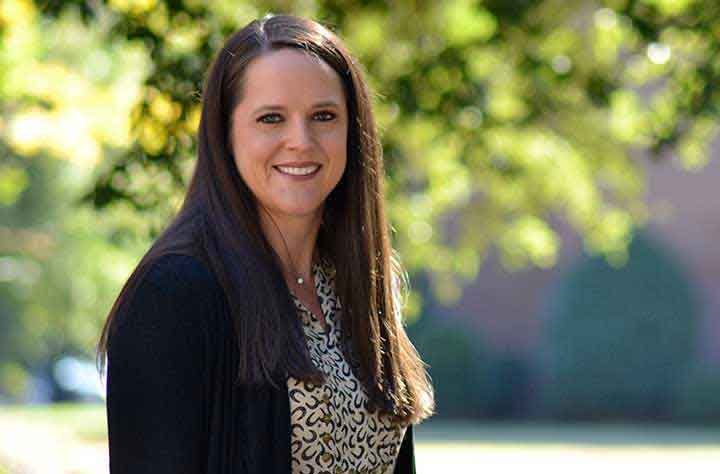 Professor Megan McNahon stands in the quad at Wesleyan