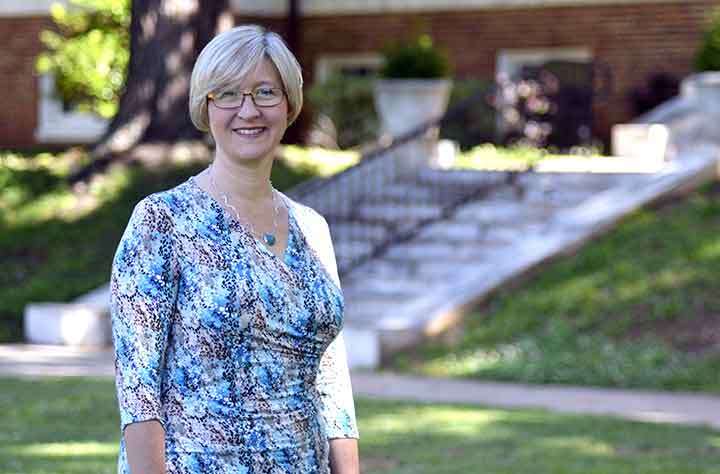 Sarah Jacqueline Harrell DeSmet outside in quad