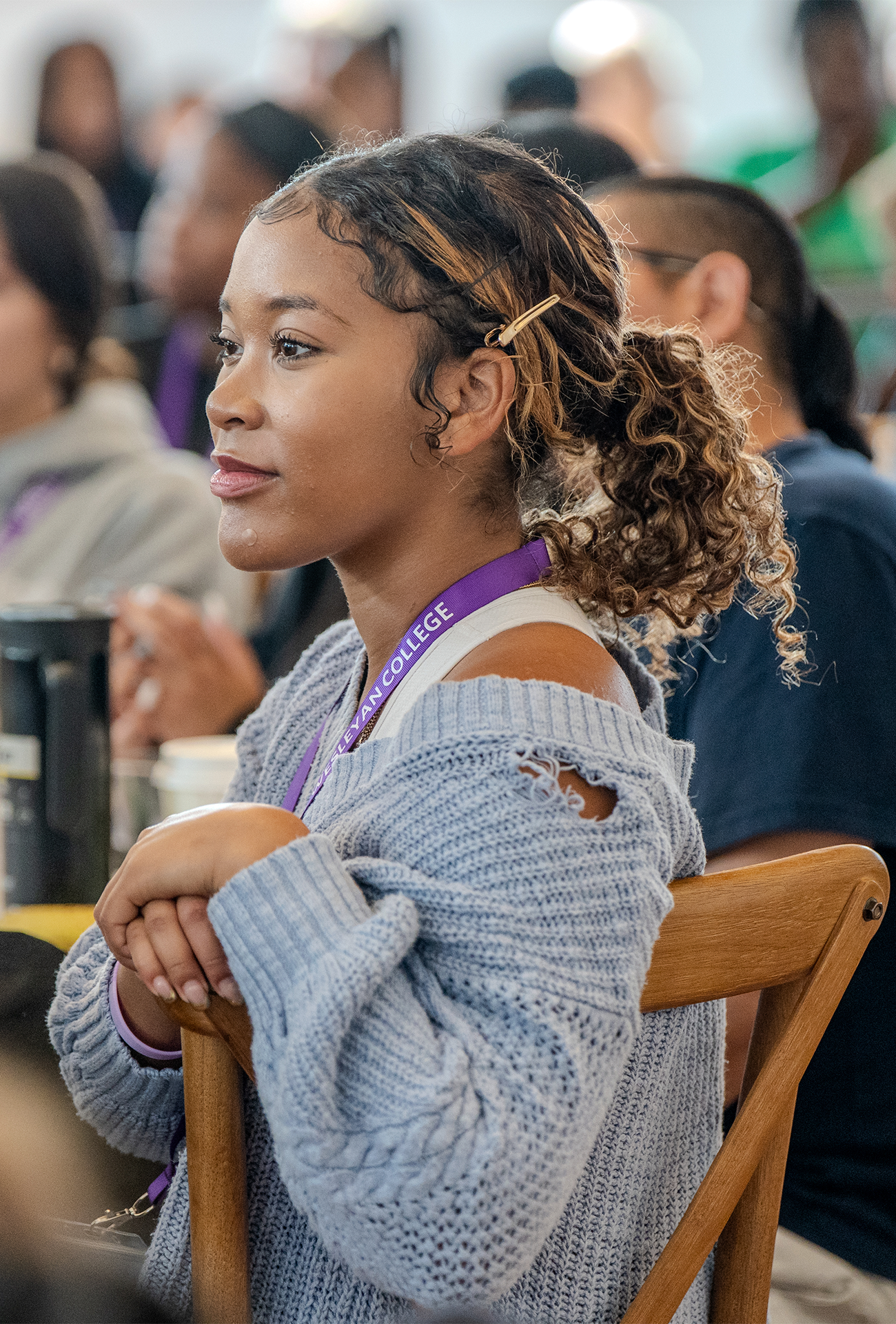 EWD Student Student sitting at a table, engaged in listening