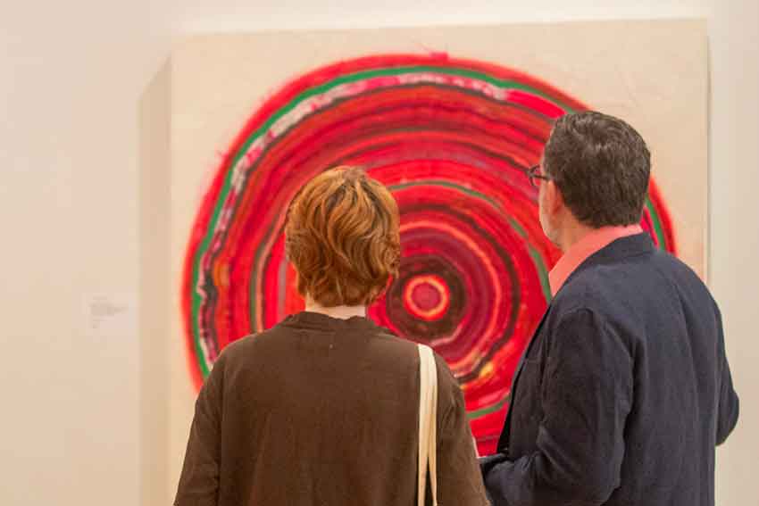 Art Exhibits: Two gentlemen looking at the artwork.
