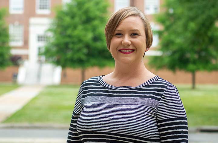 Enrollment Coordinator, Jessica Tucker smiles for the camera.
