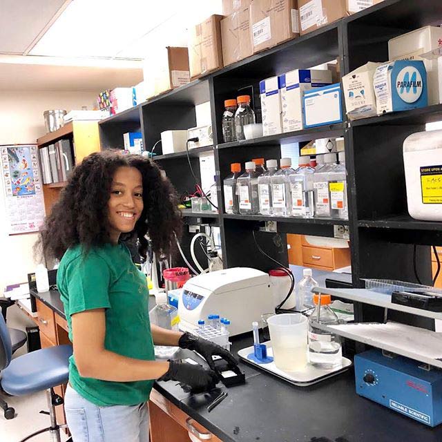 Student Kristen Kelley in the lab