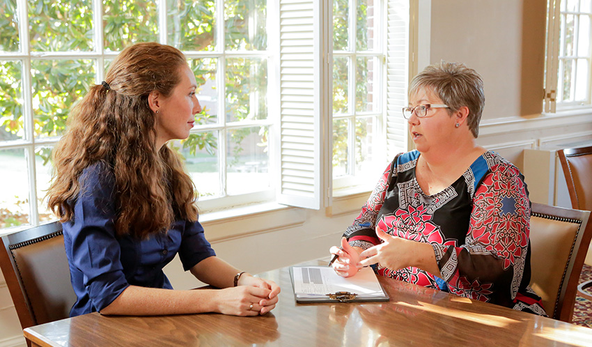 Wesleyan Student being interviewed by a local business member.