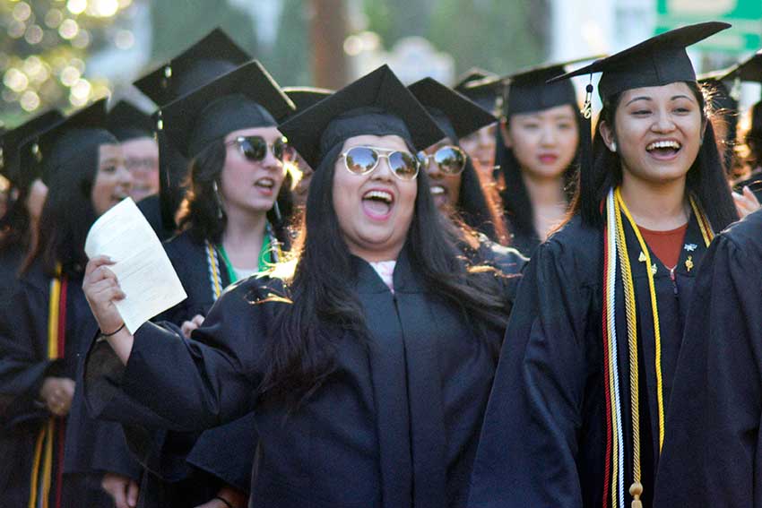 Student walking in the Baccalaureate service