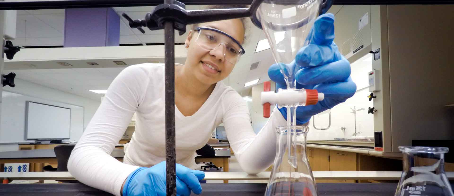 Chemistry student working on experiment