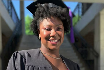 Student in cap and gown.