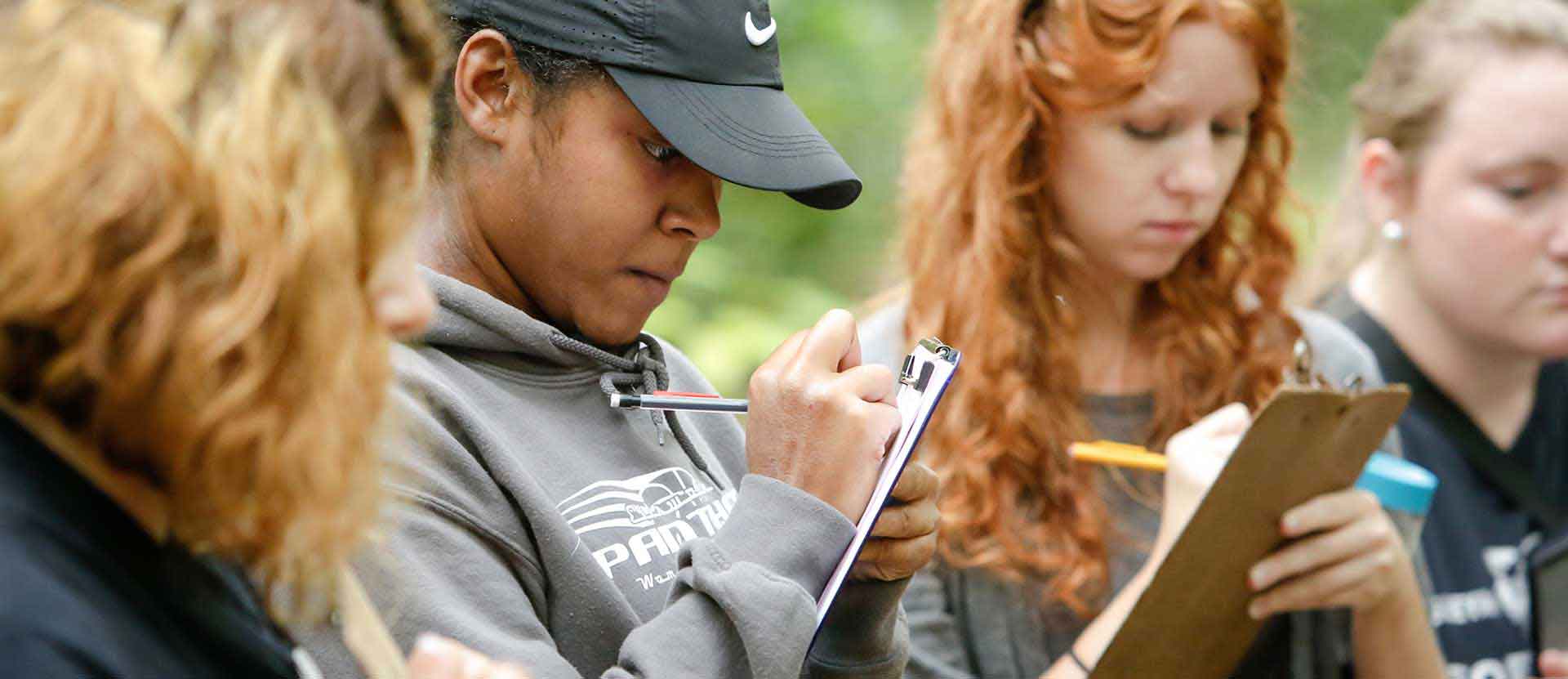 Students collect data from the Arboretum