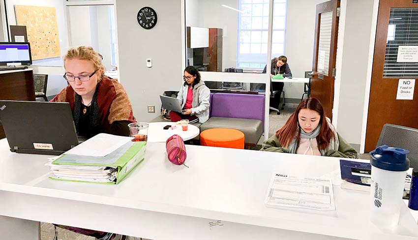 Students in the ARC center in the library.