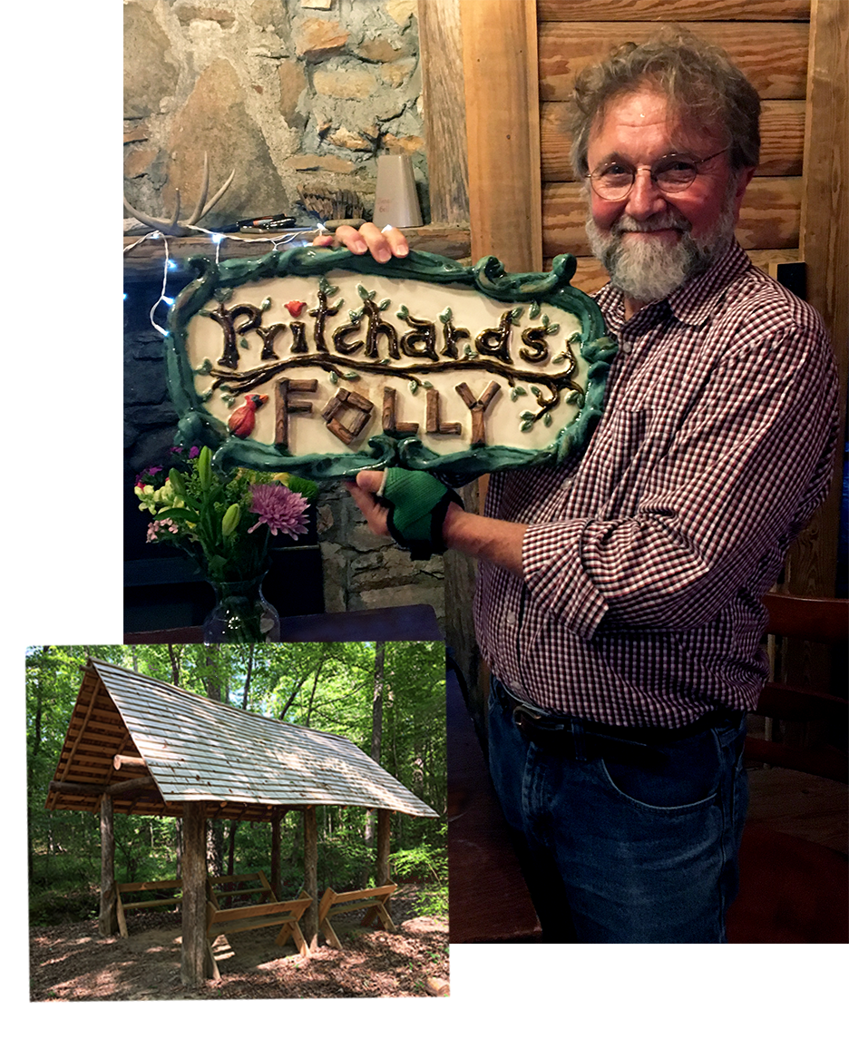 Pat Pritchard holds sign that reads Pritchard's Folly.