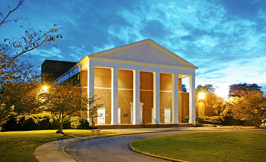 Porte Fine Arts Building at night.